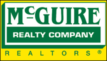 McGUIRE realty company realtors®